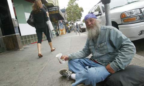 homeless man panhandling