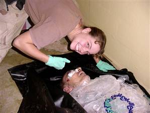 Sabrina Harmon with the corpse of Manadel al-Jamadi